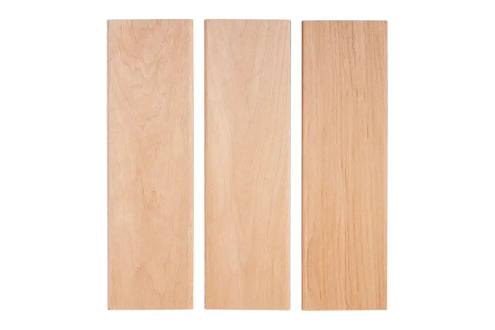 Three vertical wooden slats with a light, natural grain on a white background.